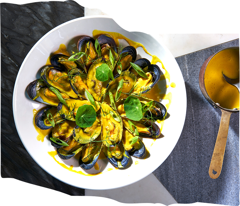 Muscles in yellow sauce.