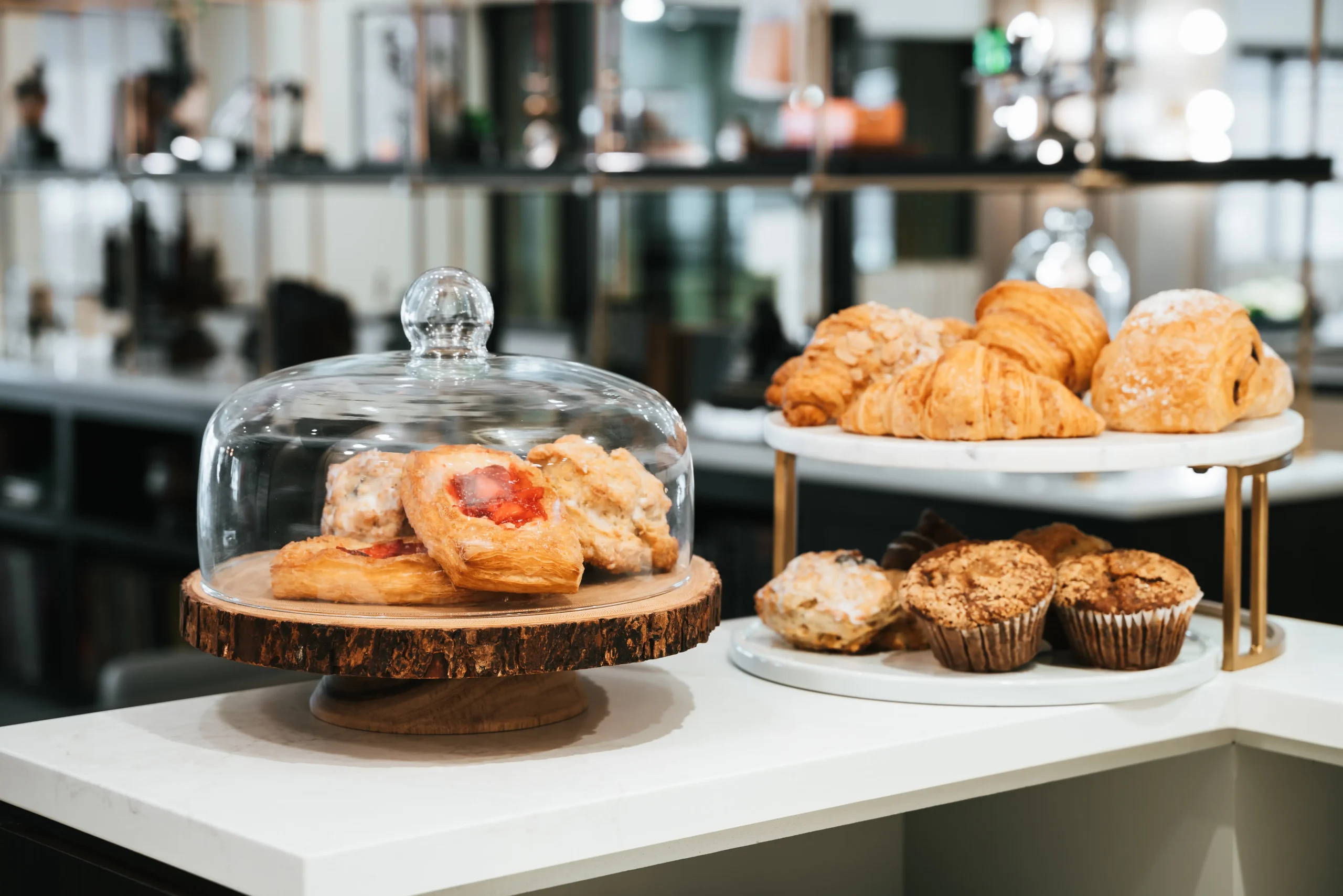 A selection of pastries in multiple dishes.
